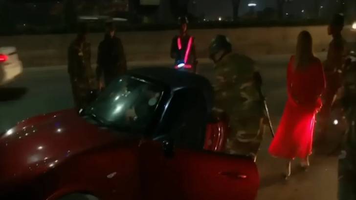 রাজধানীতে গাড়িতে মদপান, এক নারী আটক