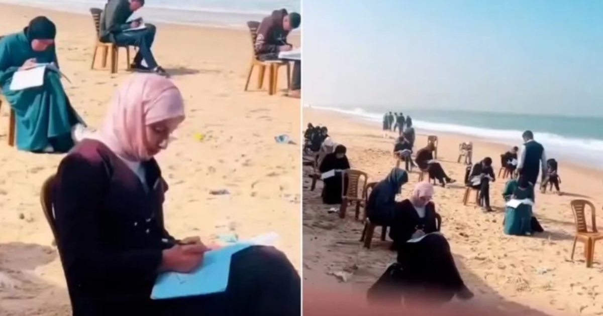 স্কুল-কলেজ ধ্বংস, গাজায় সাগরতীরে বসে পরীক্ষা দিচ্ছেন শিক্ষার্থীরা